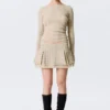Studded Pleated Mini Skirt – Beige Studded Pleated Mini Skirt – Beige