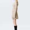 Studded Pleated Mini Skirt – Beige Studded Pleated Mini Skirt – Beige