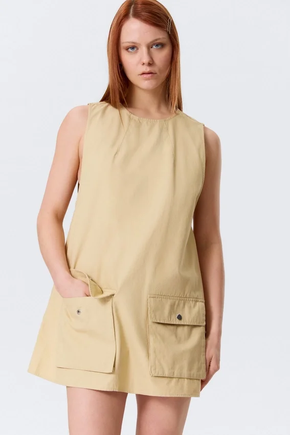 Utility Cotton Canvas Mini Pinafore Dress – Light Yellow Utility Cotton Canvas Mini Pinafore Dress – Light Yellow