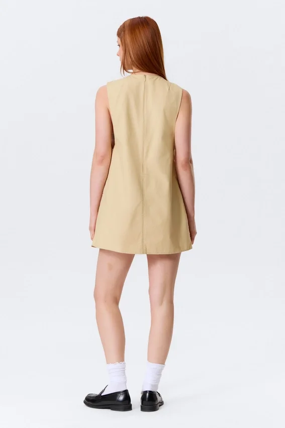 Utility Cotton Canvas Mini Pinafore Dress – Light Yellow Utility Cotton Canvas Mini Pinafore Dress – Light Yellow