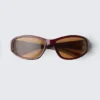 Wrap-Around Sunglasses – Transparent Red – Brown Lenses Wrap-Around Sunglasses – Transparent Red – Brown Lenses