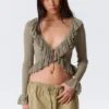 Yulia B Frilled Knitted V-Neck Cardigan – Dusty Khaki Green Yulia B Frilled Knitted V-Neck Cardigan – Dusty Khaki Green